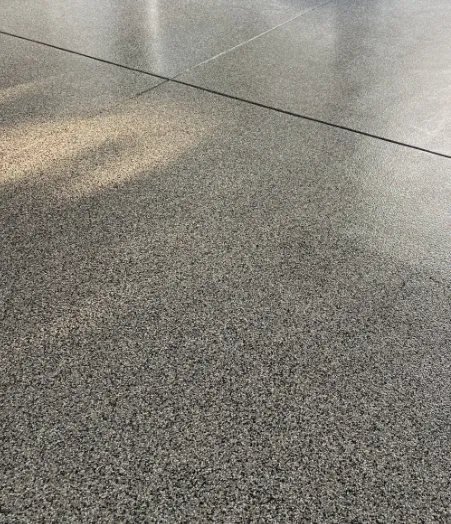 Finished residential garage floor coating